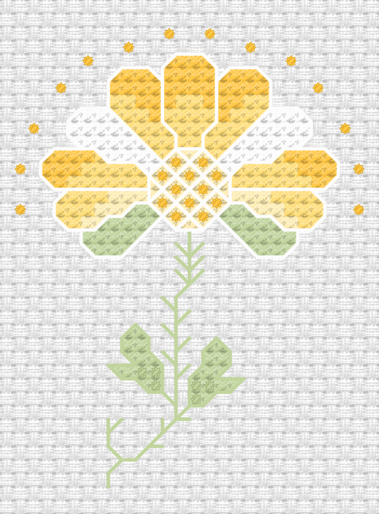 Litet korsstygnsbroderi med en blomma i gult och vitt.
