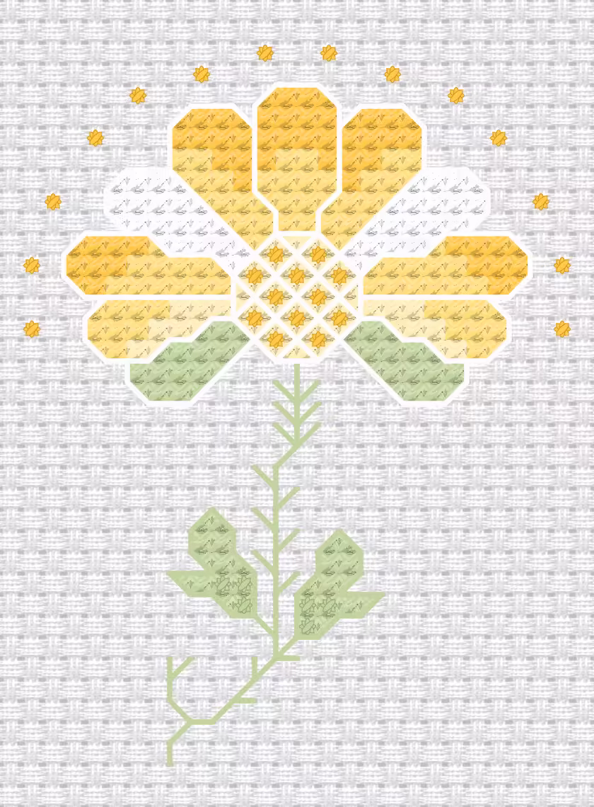 Litet korsstygnsbroderi med en blomma i gult och vitt.
